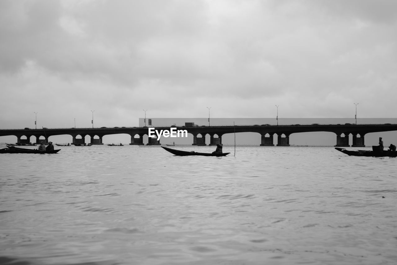 Bridge over river against sky