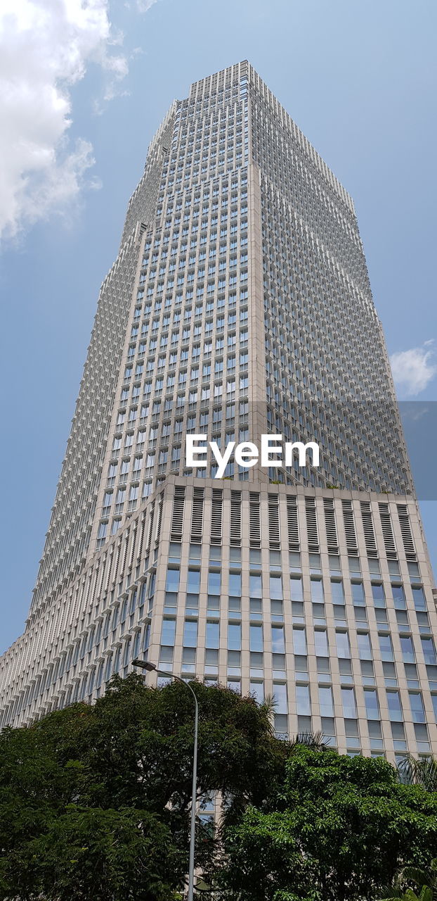 Low angle view of modern building against sky