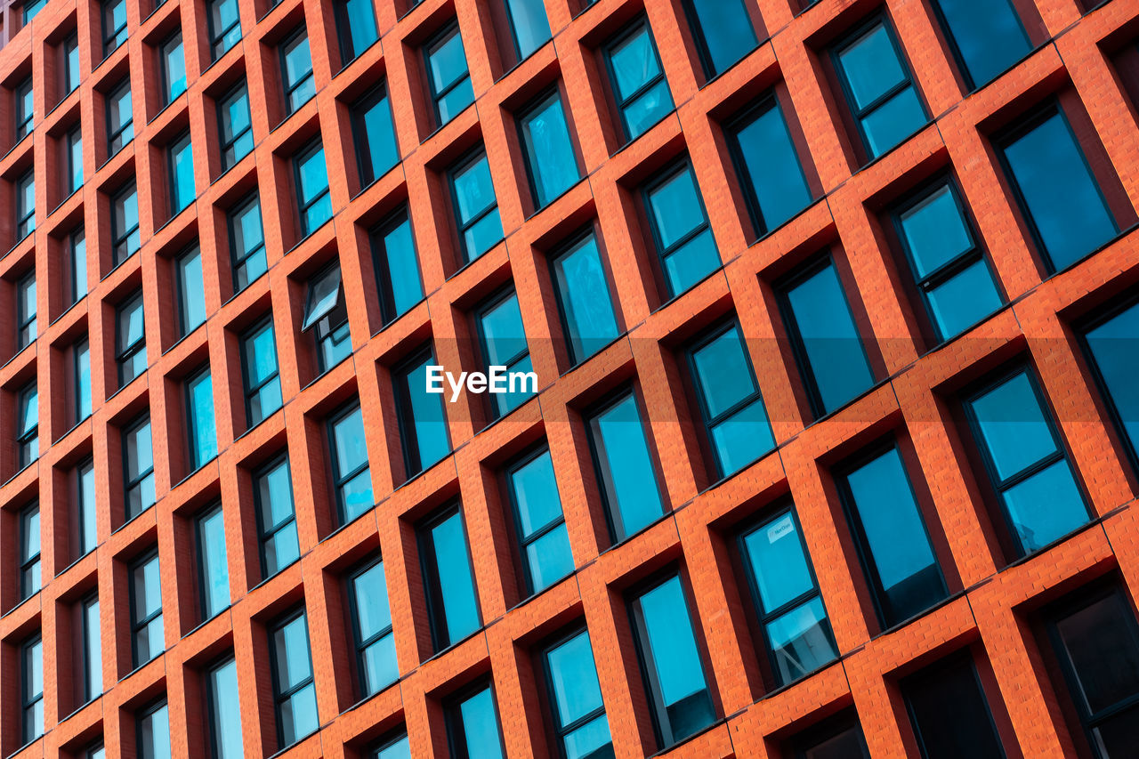 Close up of windows on newly built flats creating a pattern effect