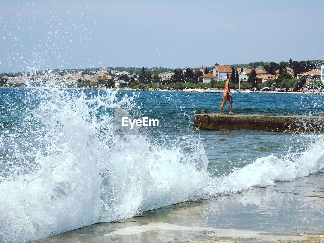 WAVES SPLASHING ON SHORE