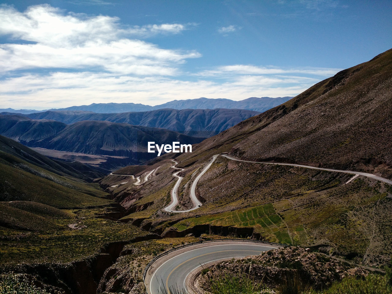Narrow road along rocky landscape