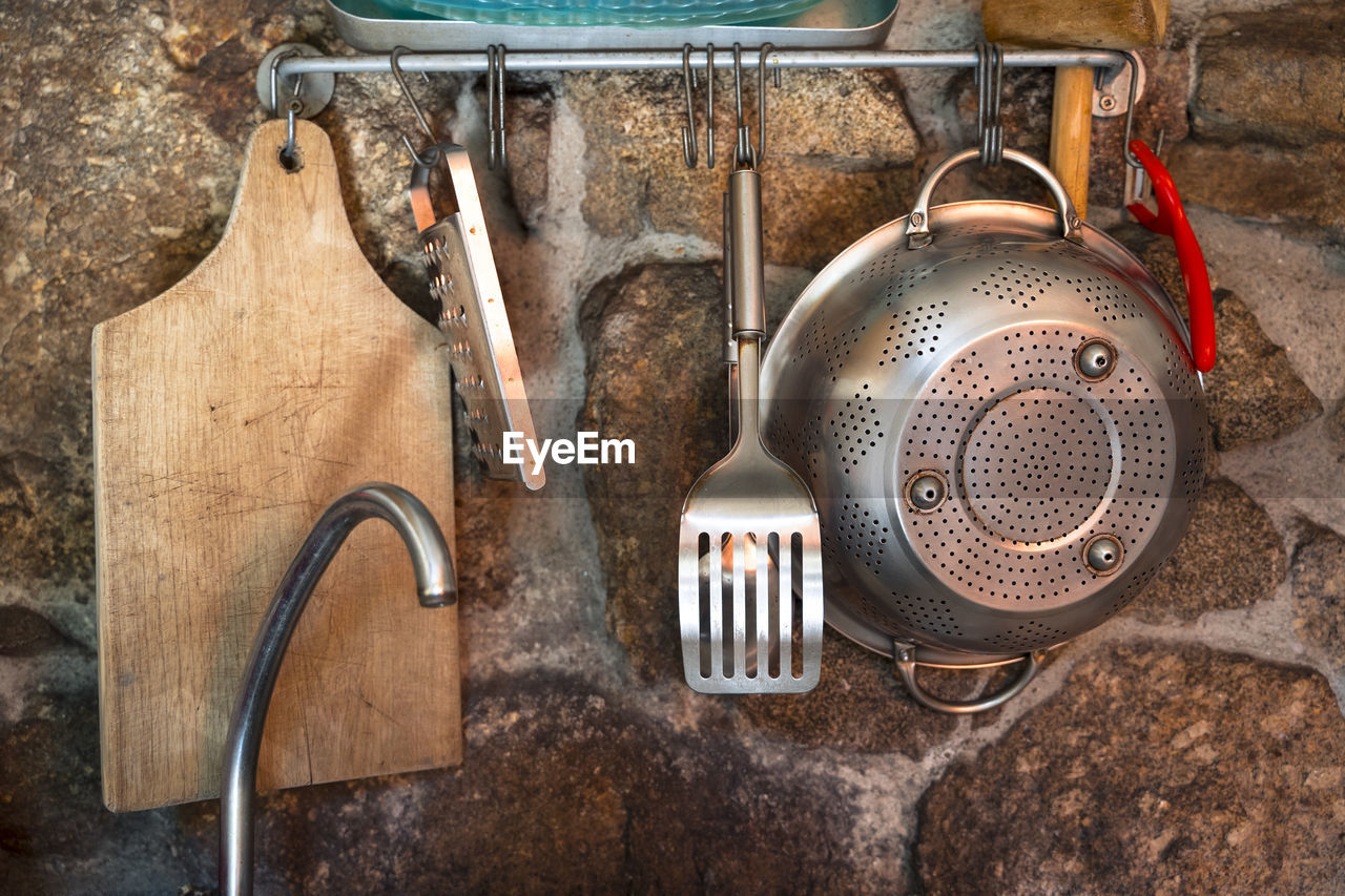 DIRECTLY ABOVE SHOT OF CLOTHES HANGING ON WOOD