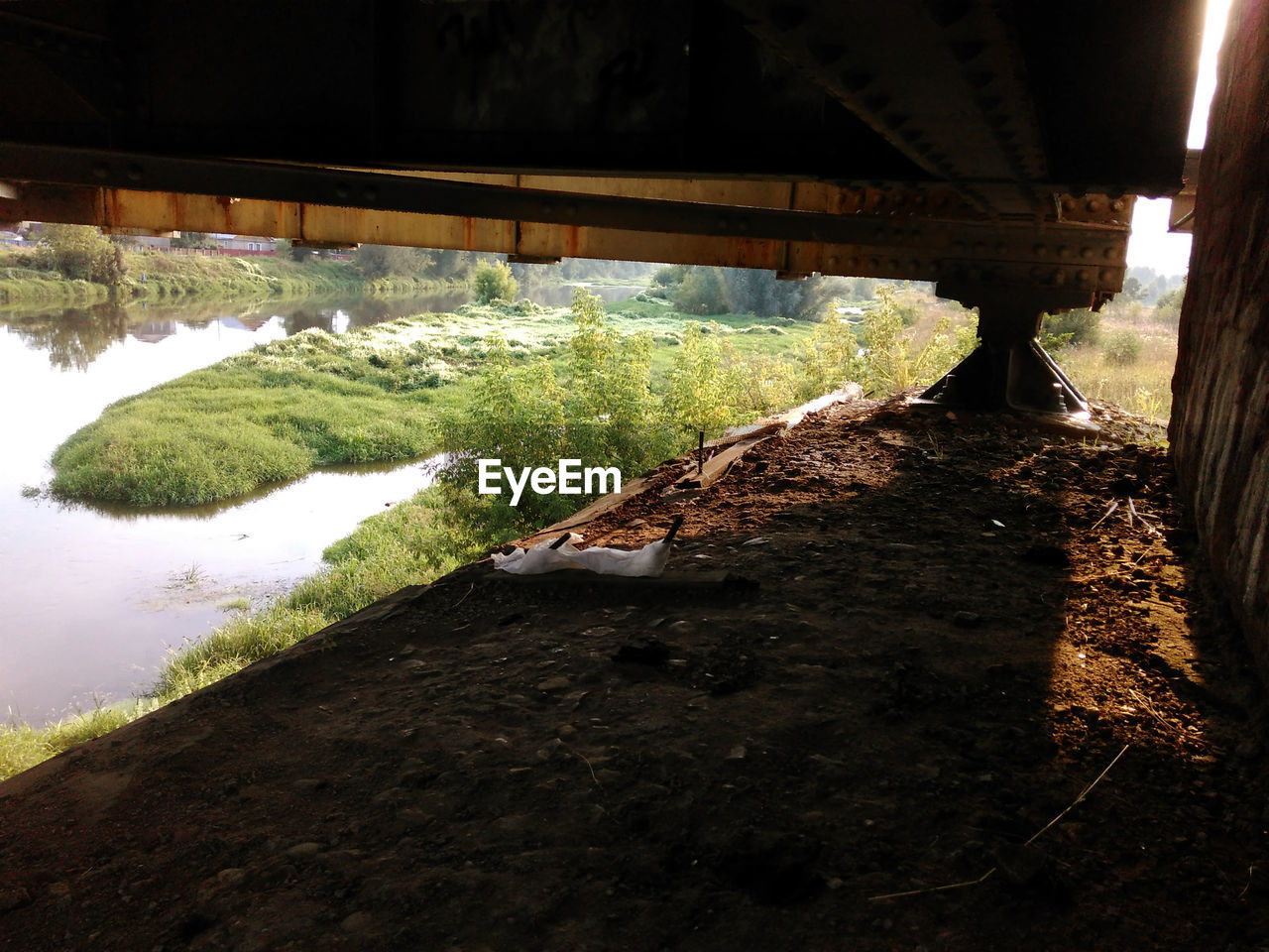 VIEW OF BRIDGE IN WATER