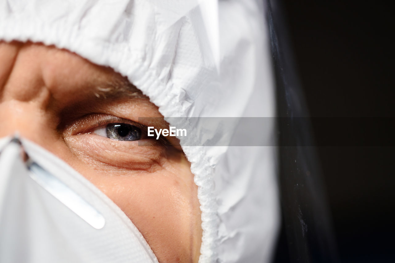 human face, close-up, skin, adult, human eye, portrait, human head, healthcare and medicine, one person, nose, indoors, white, young adult, eye, person, headshot, protective mask - workwear, women, security, looking at camera, protection, looking, doctor, baby, clothing, men