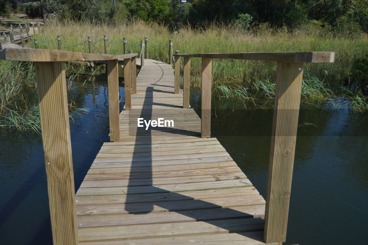 WOODEN PIER ON LAKE