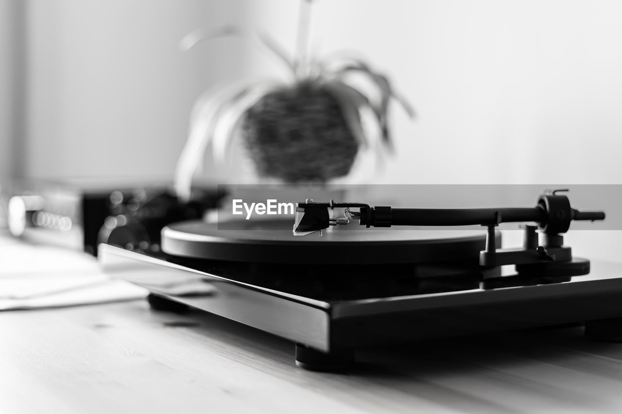 Close-up of turntable on table