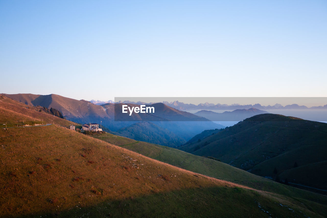 SCENIC VIEW OF LANDSCAPE AGAINST CLEAR SKY