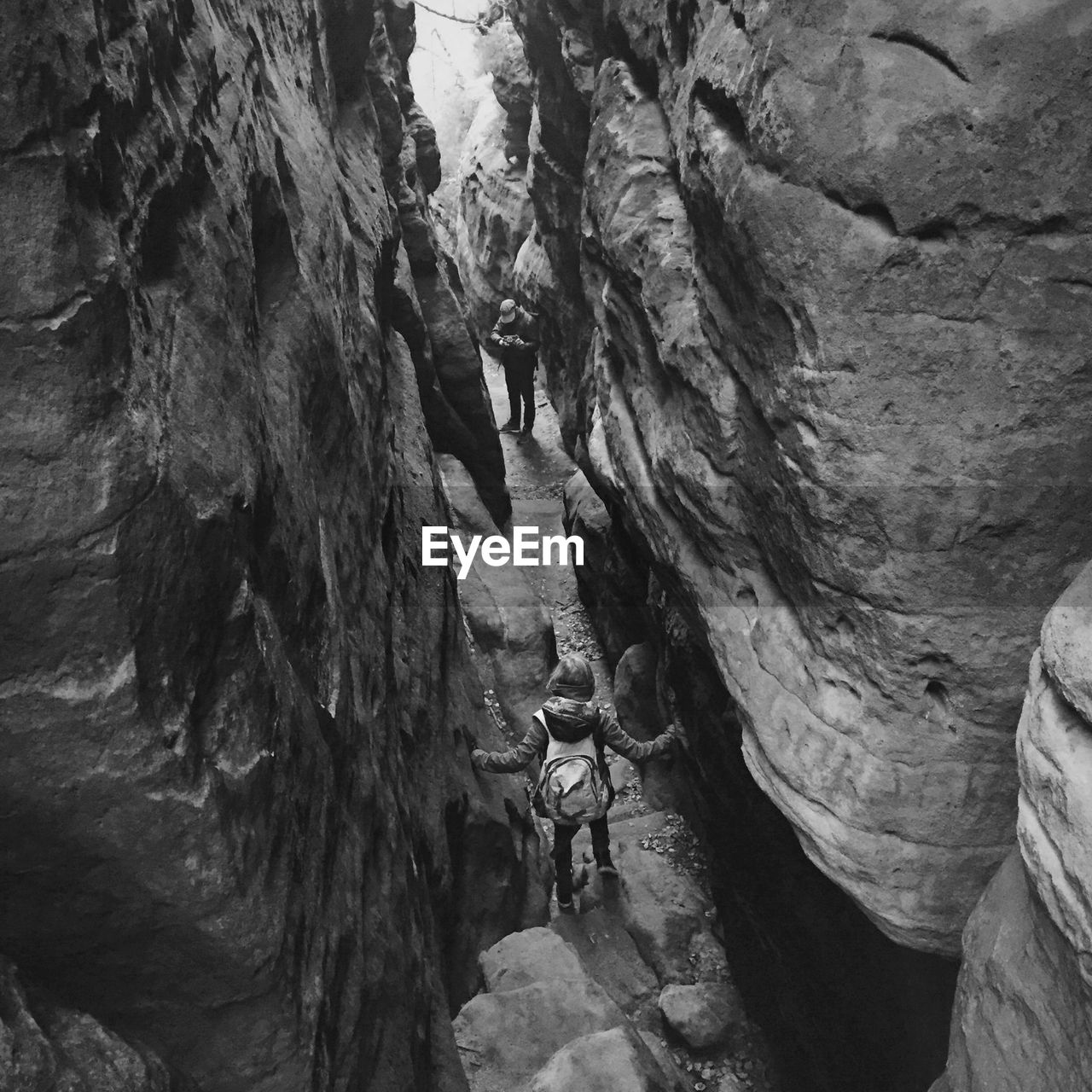 High angle view of people amidst rocks