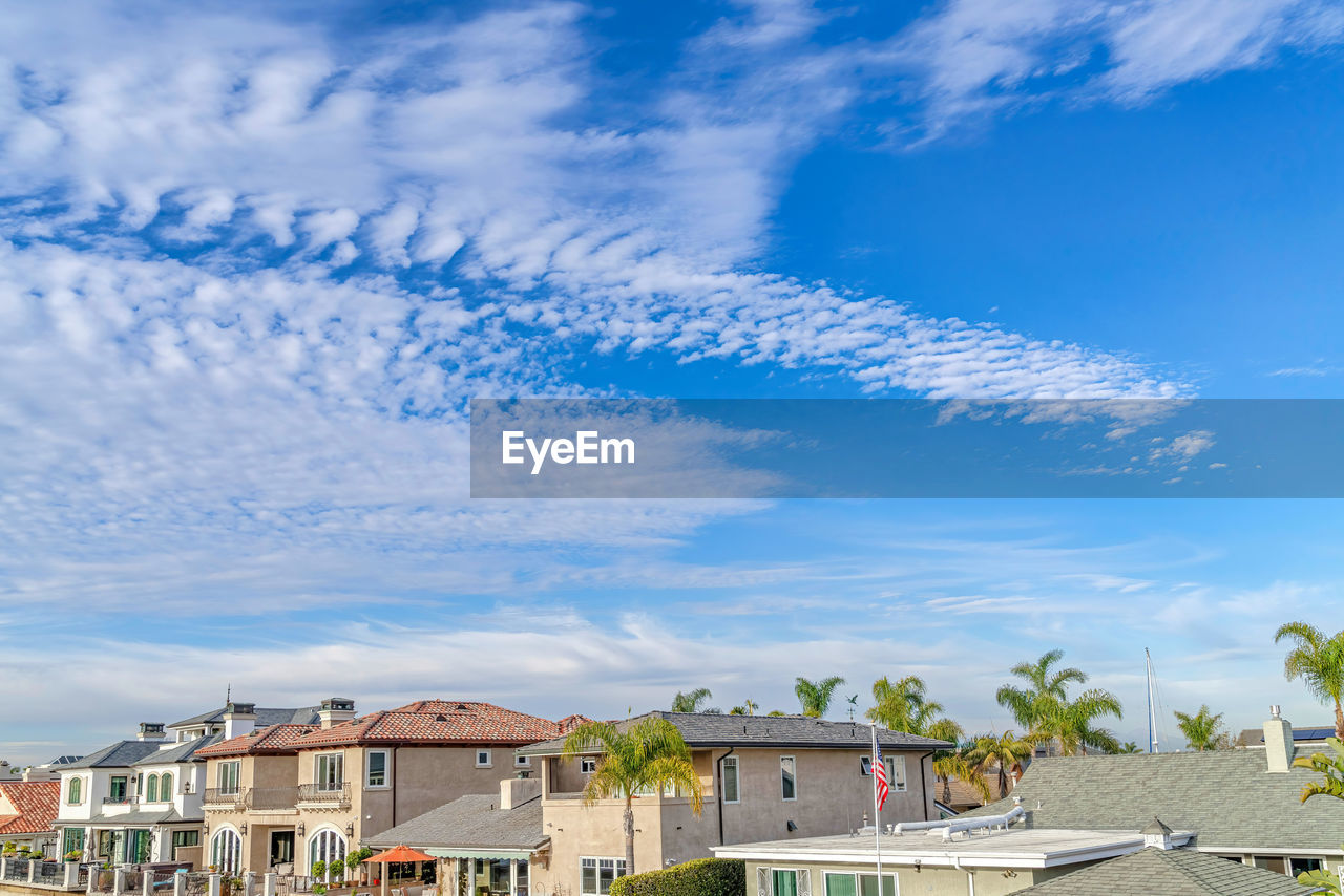 TOWNSCAPE AGAINST SKY