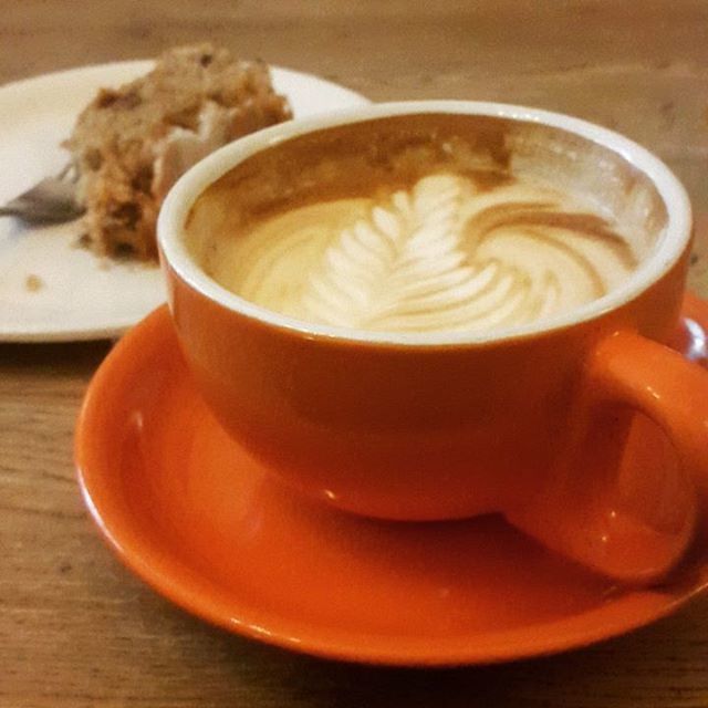 CLOSE-UP OF COFFEE CUP ON TABLE