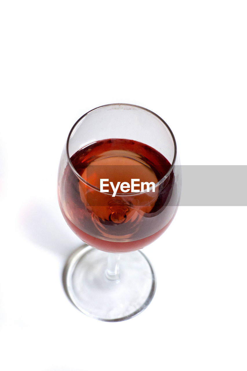 High angle view of wineglass on table