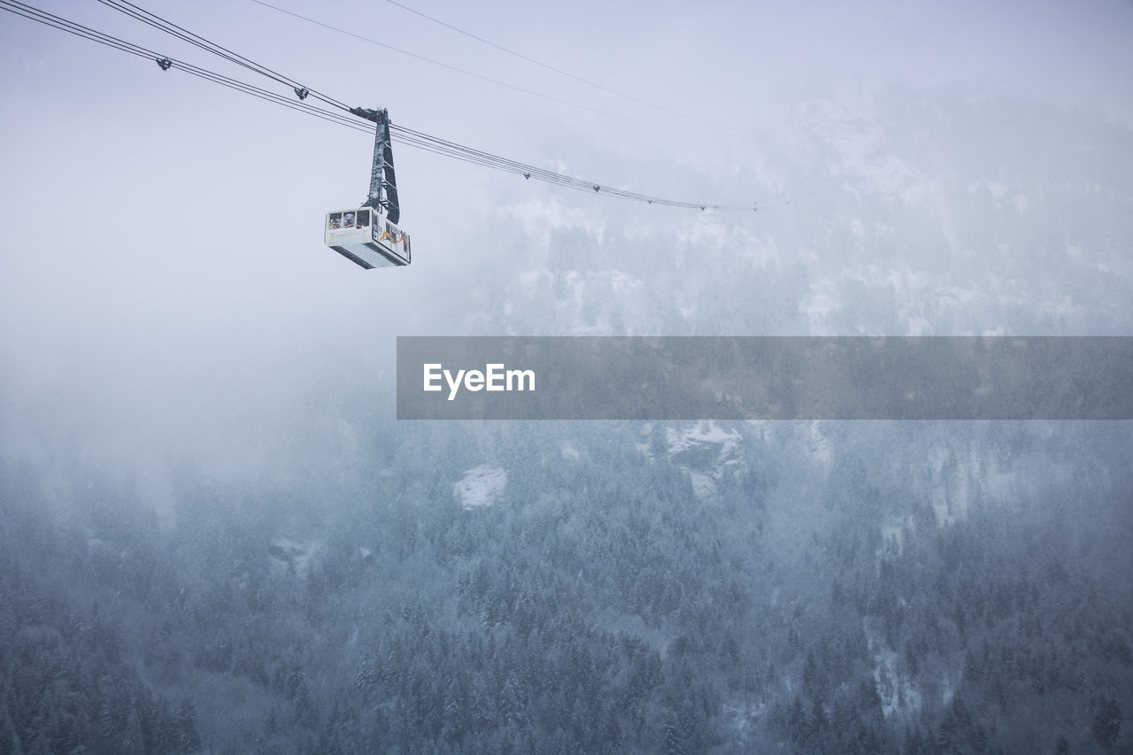 Cable car from the winter sports resort of vaujany leading to the grandes rousses massif 