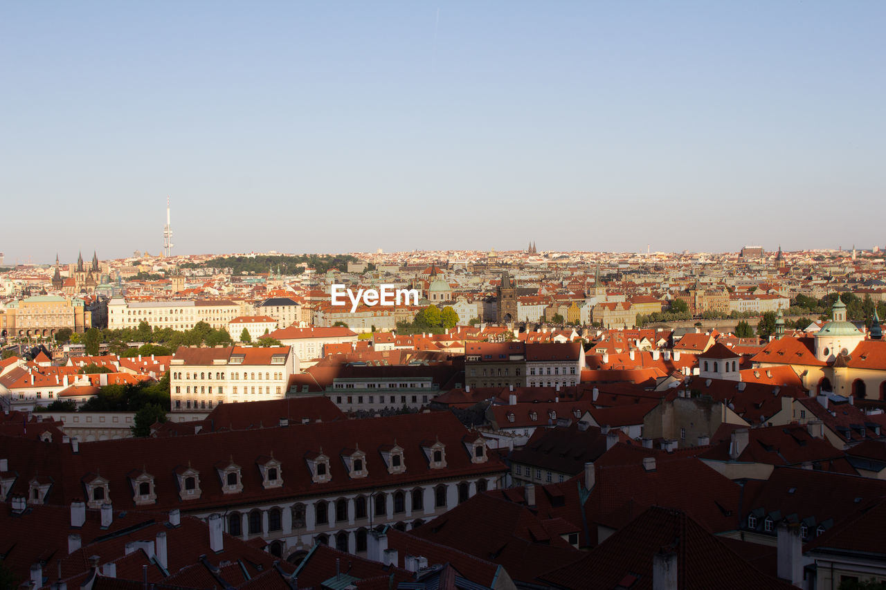 HIGH ANGLE SHOT OF TOWNSCAPE AGAINST SKY