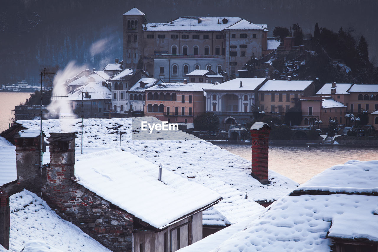 Houses in city during winter