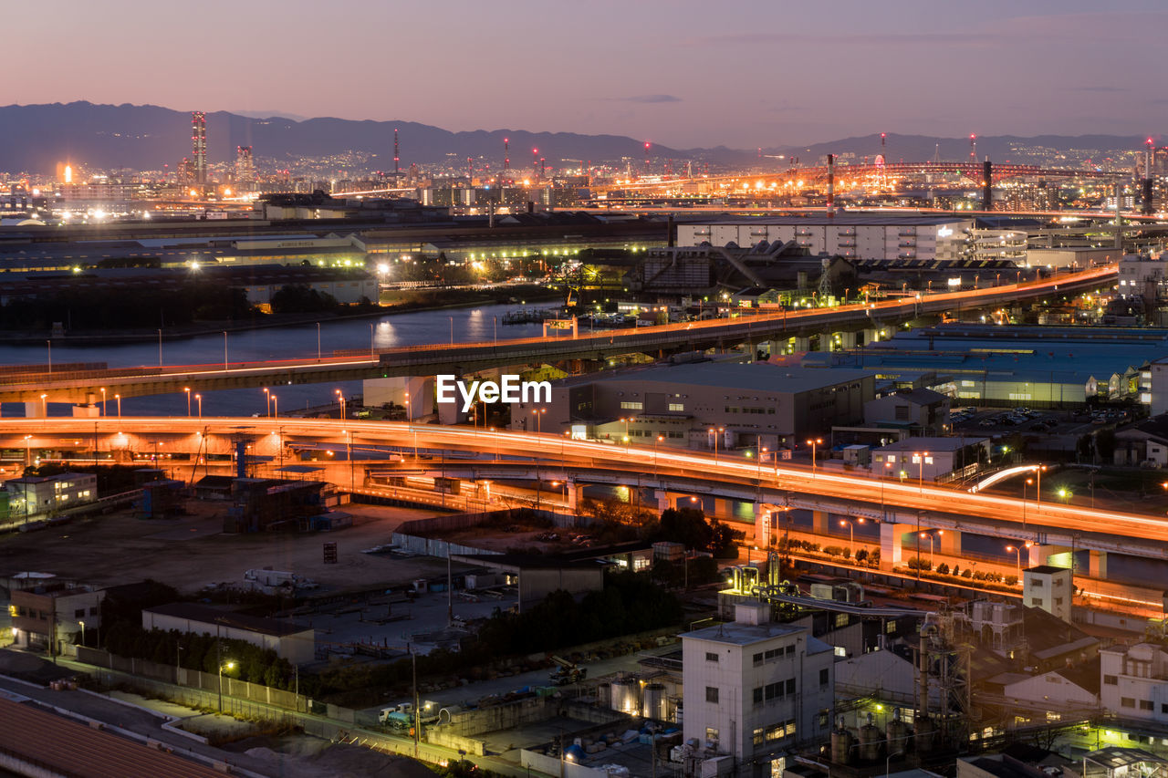 High angle view of illuminated cityscape at night