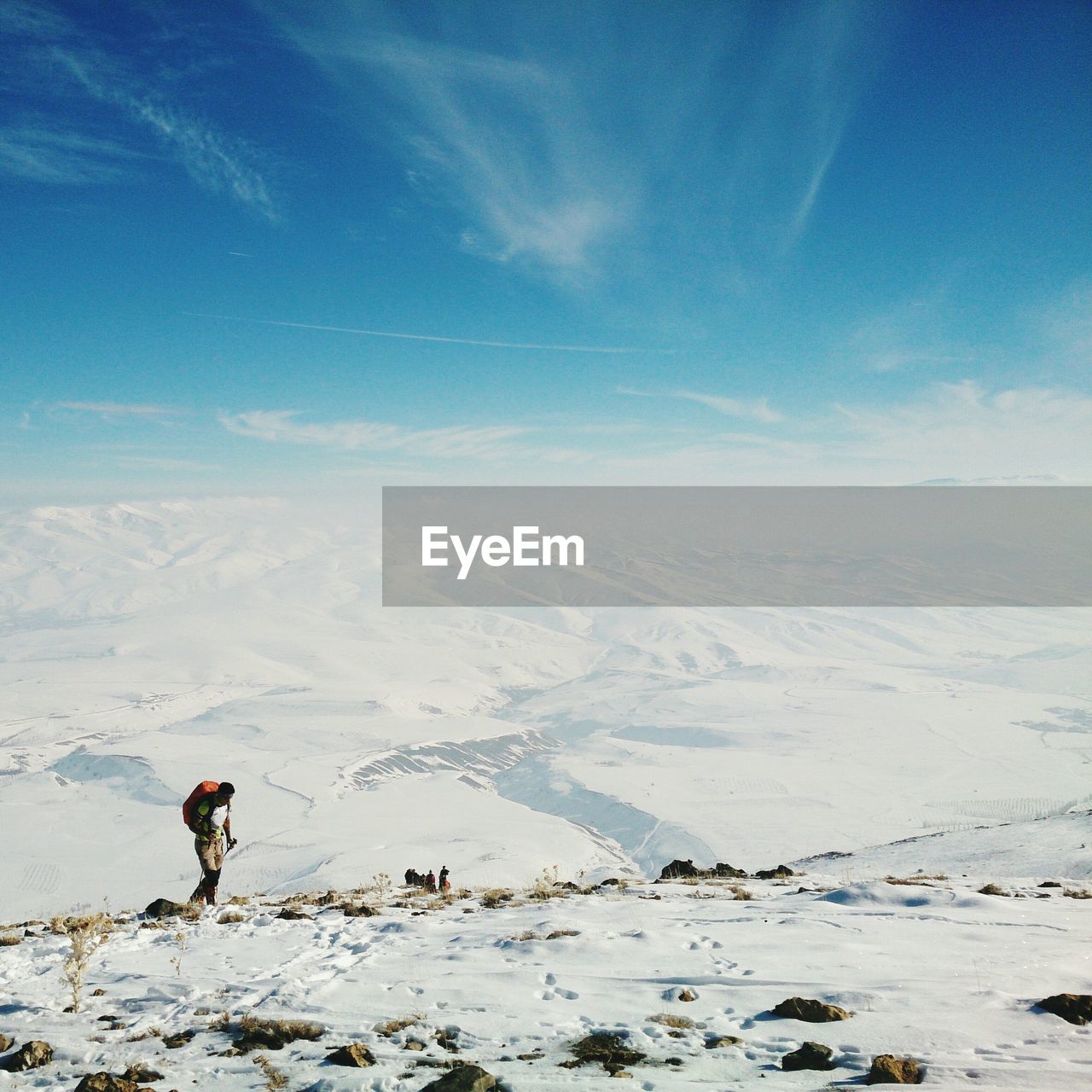 SCENIC VIEW OF SNOWCAPPED MOUNTAIN AGAINST SKY DURING WINTER