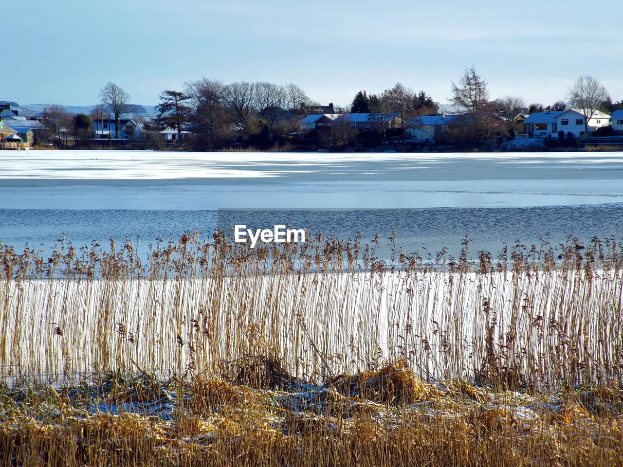 SCENIC VIEW OF SNOW COVERED LAND AGAINST SKY