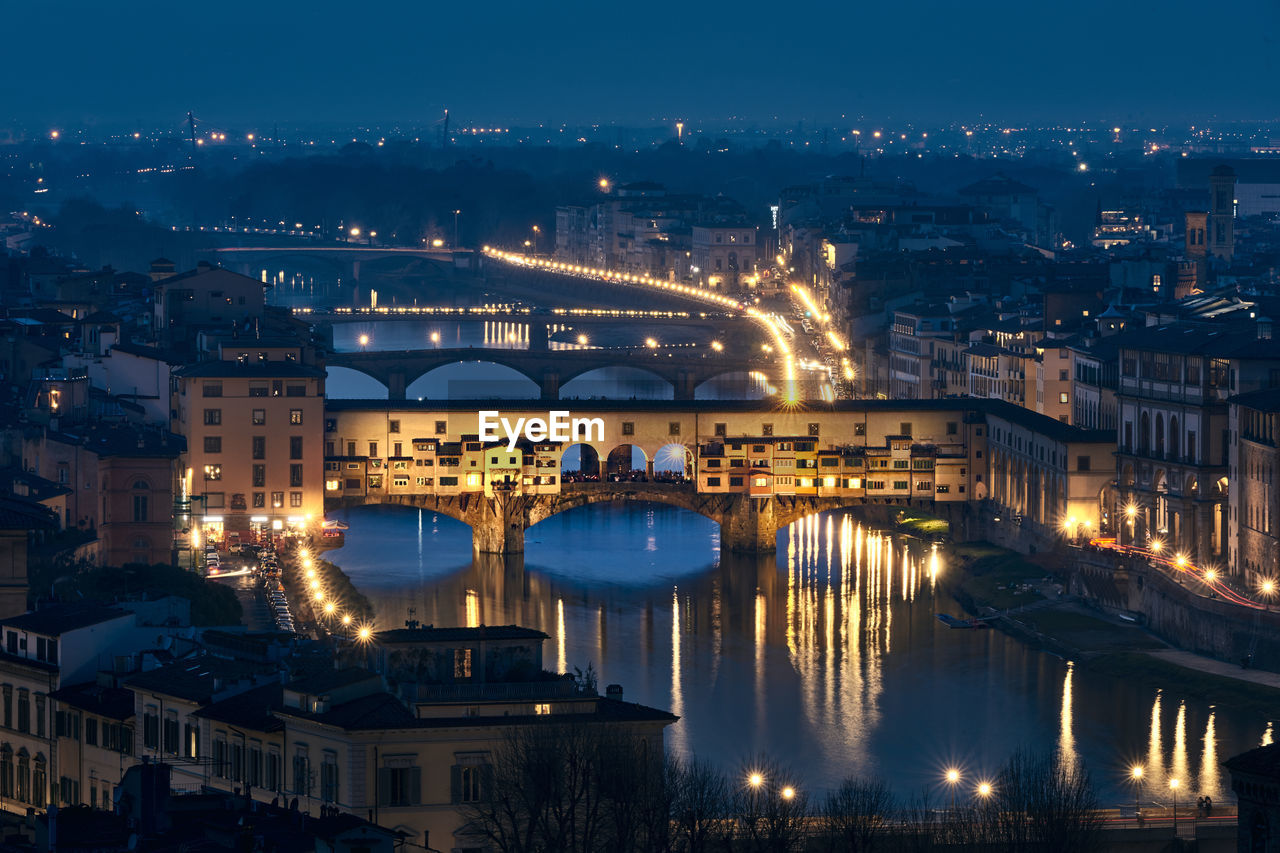 High angle view of illuminated ponte vecchio over arno river