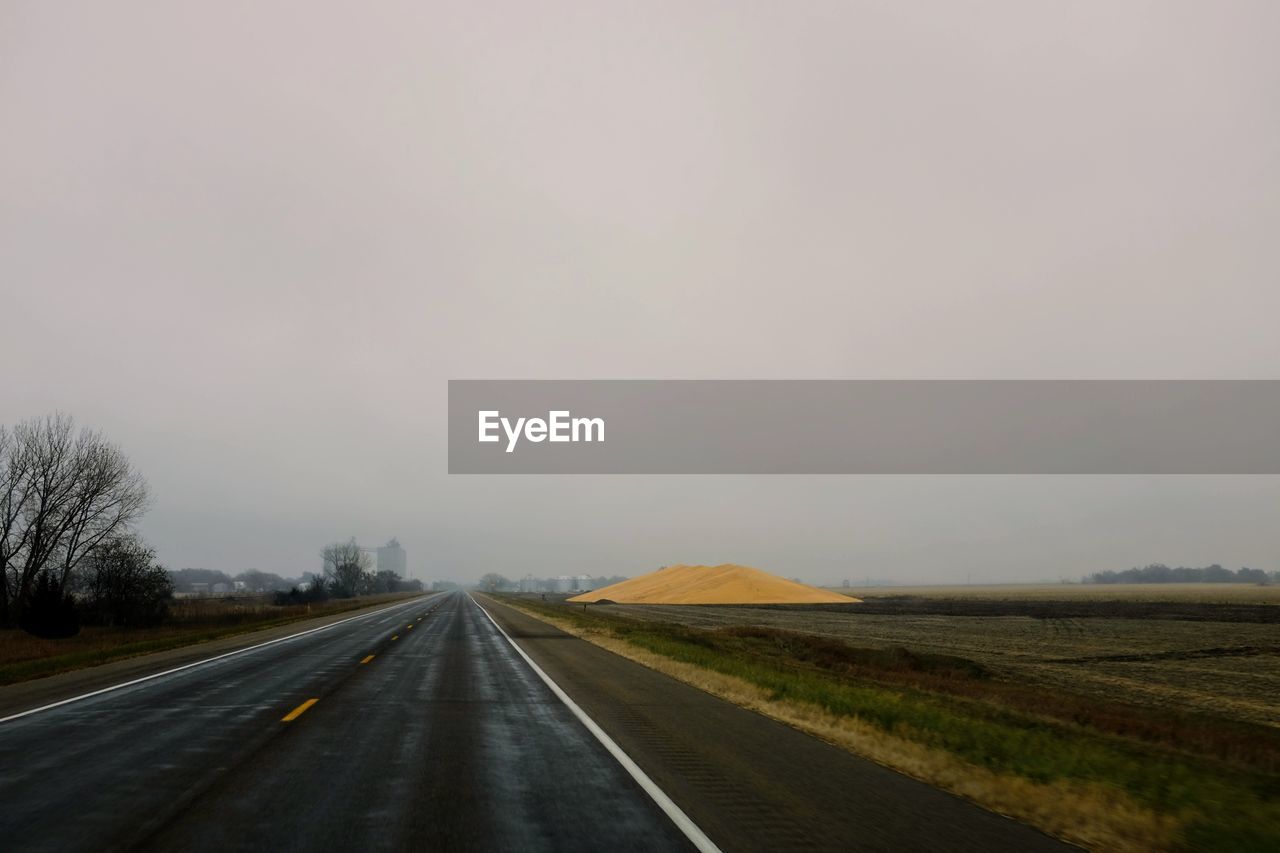 ROAD ON LANDSCAPE AGAINST SKY