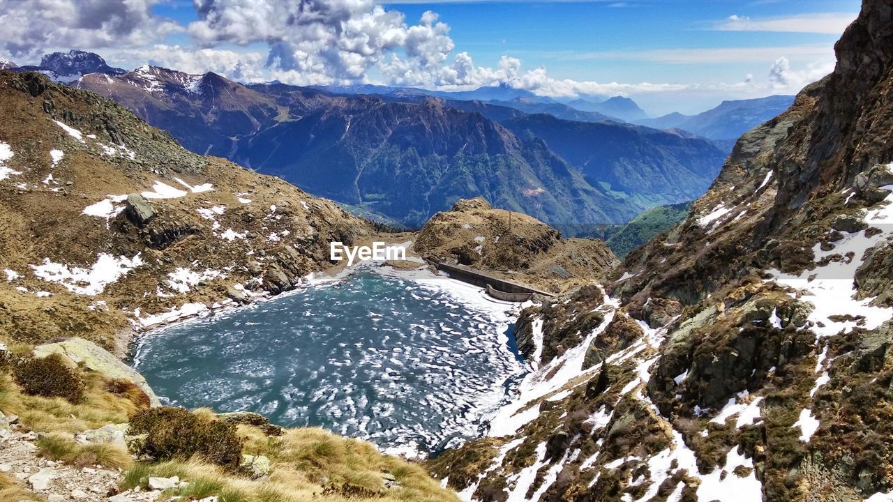 Scenic view of mountains against sky during winter