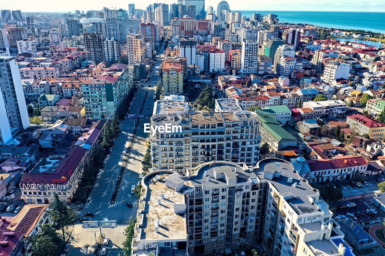 HIGH ANGLE VIEW OF MODERN CITY BUILDINGS