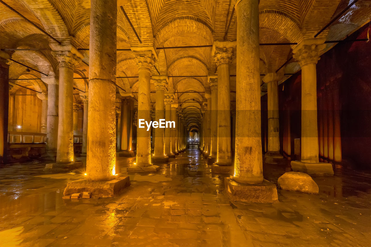 architecture, architectural column, built structure, indoors, one person, corridor, history, the way forward, illuminated, real people, day, people