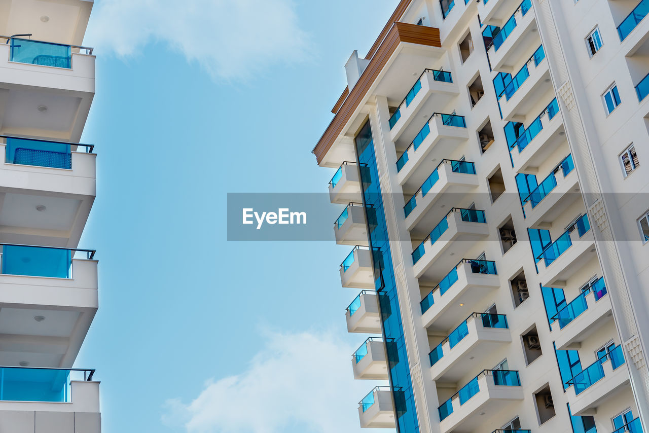 Exterior view of a modern complex of new apartment buildings. outside view of the street.