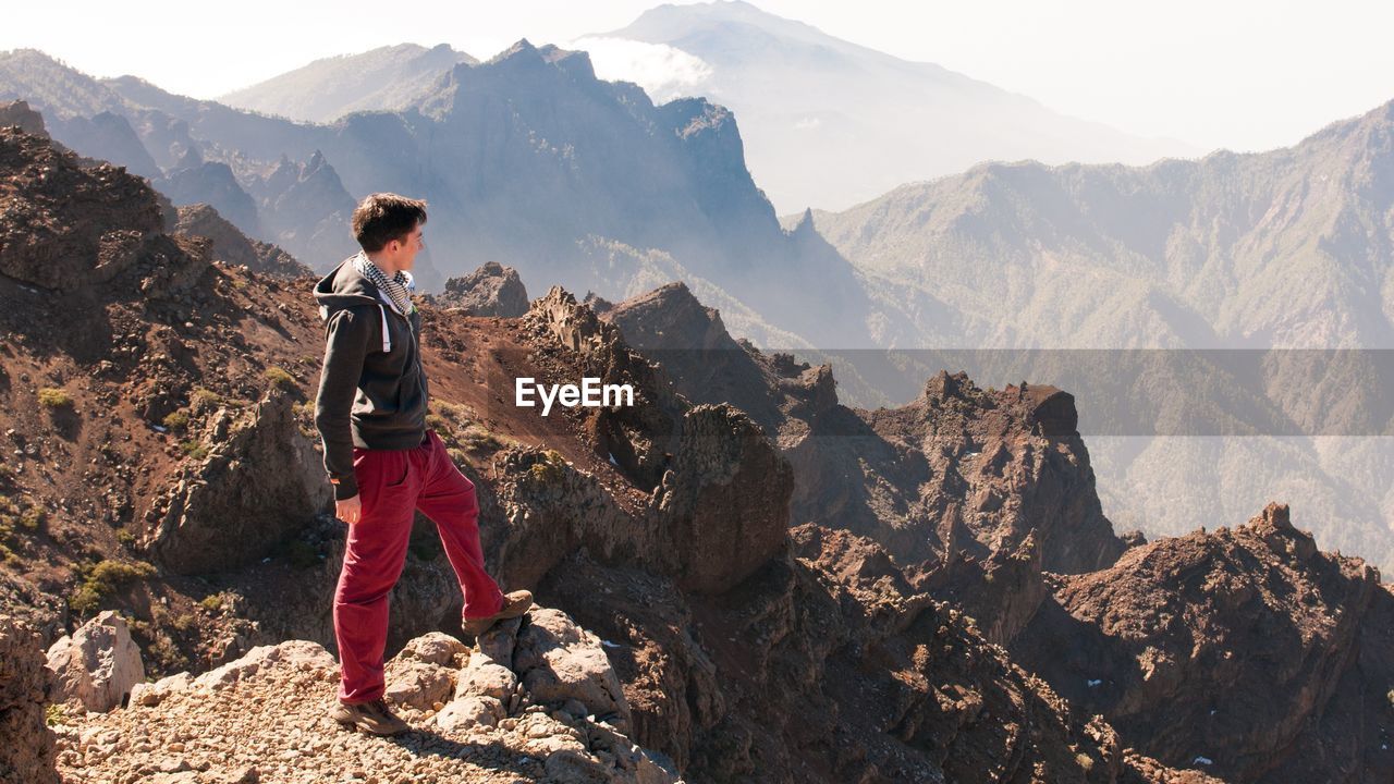 Male hiker standing on cliff