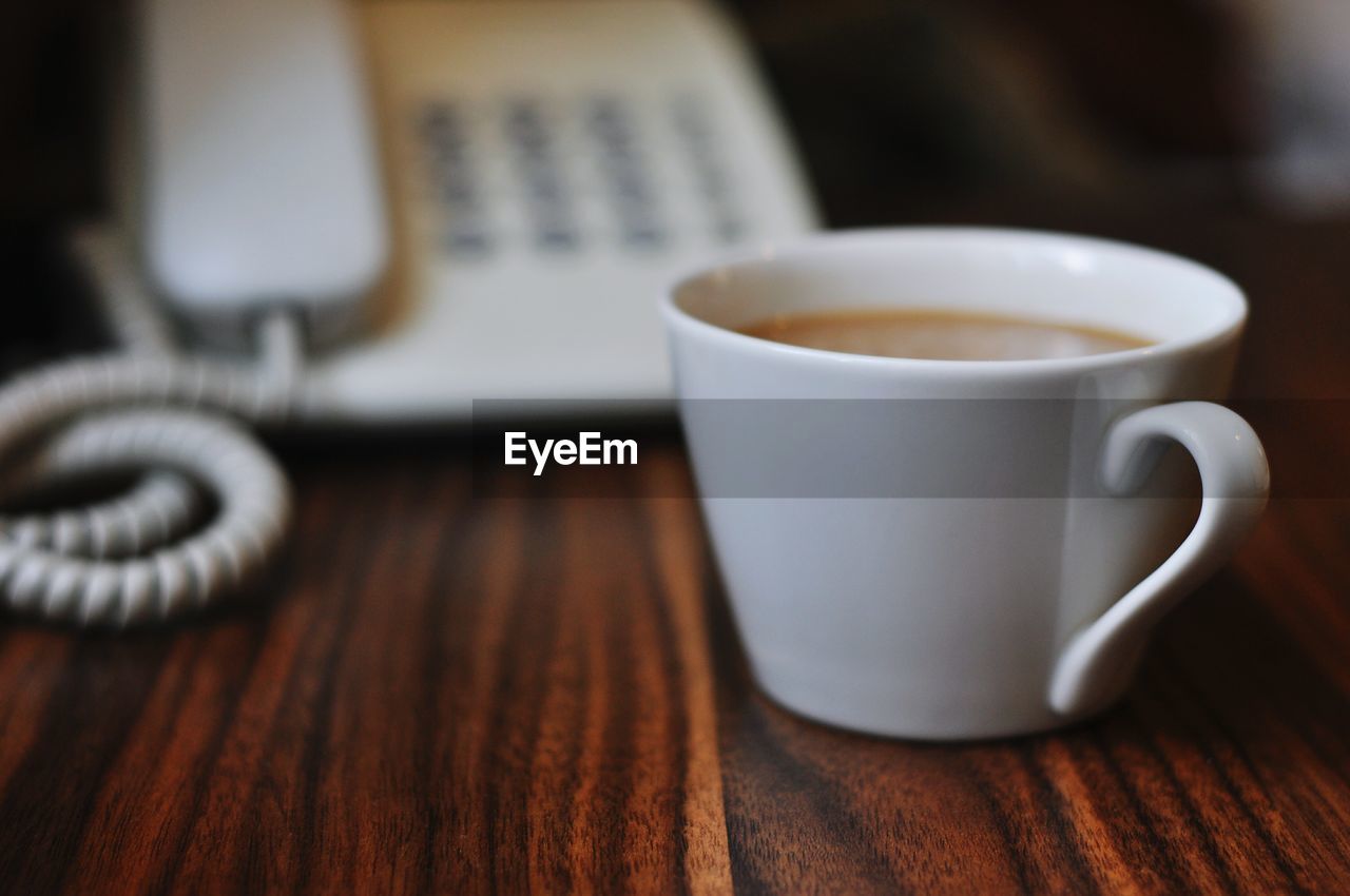 High angle view of coffee cup on table