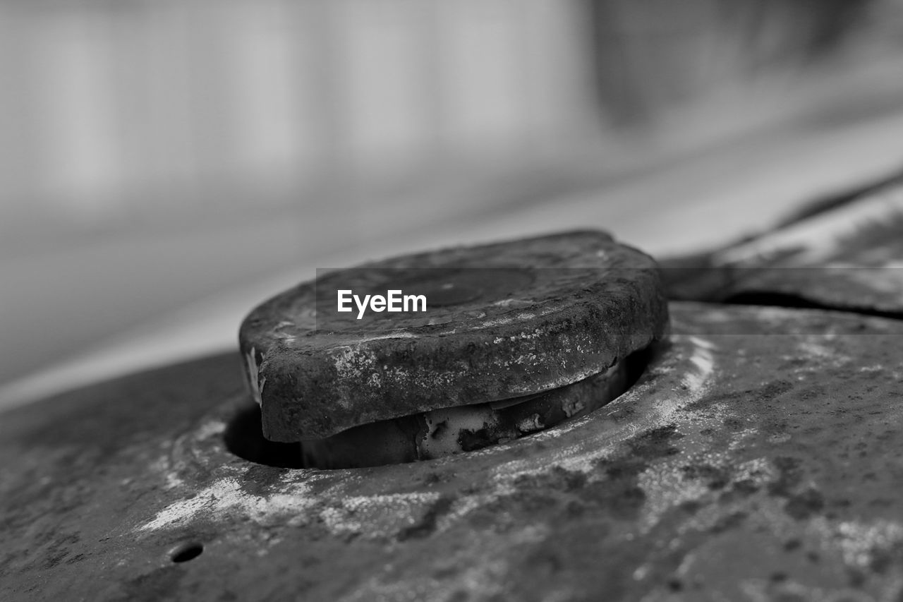 CLOSE UP OF RING IN CONTAINER