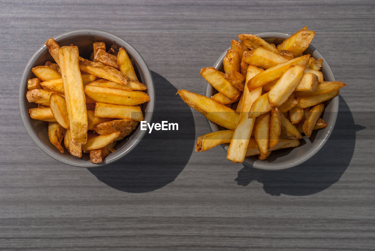 HIGH ANGLE VIEW OF MEAT AND FRIES ON PLATE