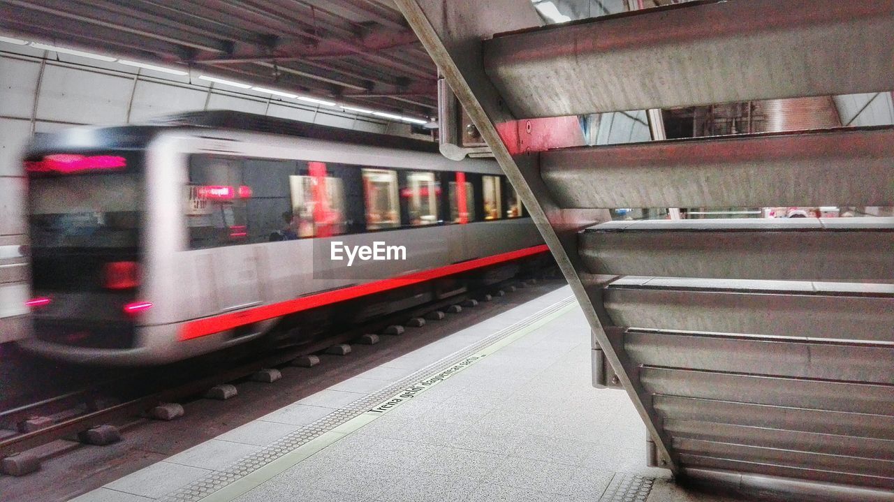 Blurred train at station