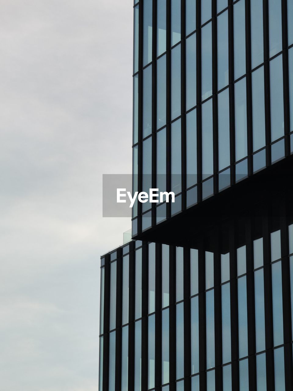 Low angle view of modern building against sky