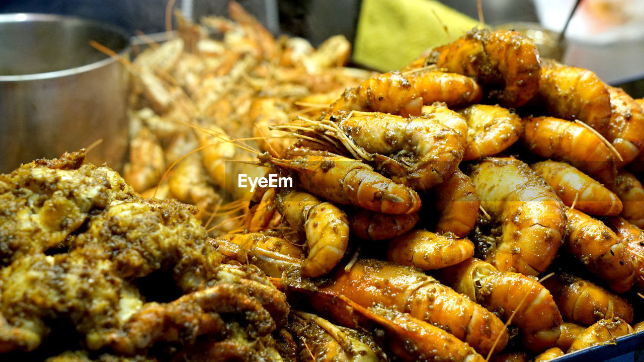 Thailand street food seafood prawn stir fry with sauce