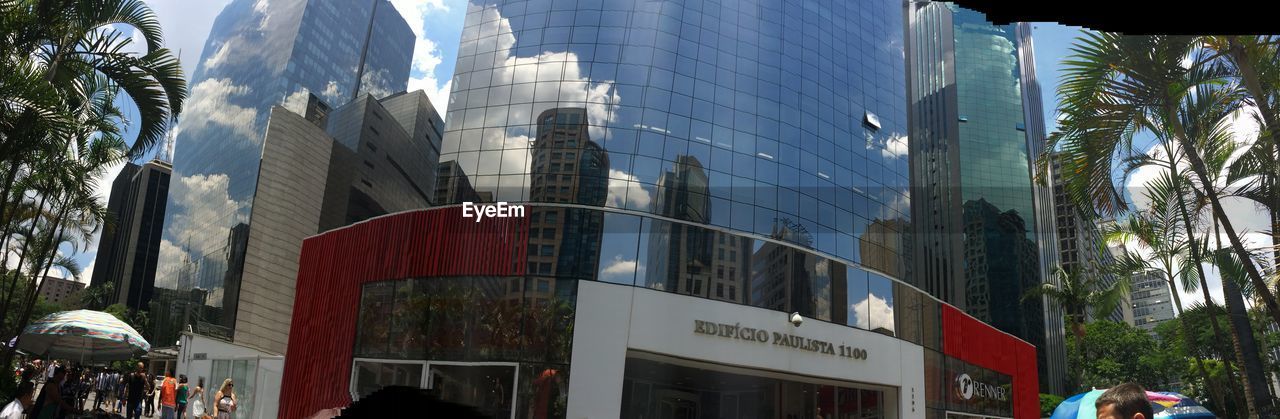 LOW ANGLE VIEW OF MODERN BUILDINGS IN CITY