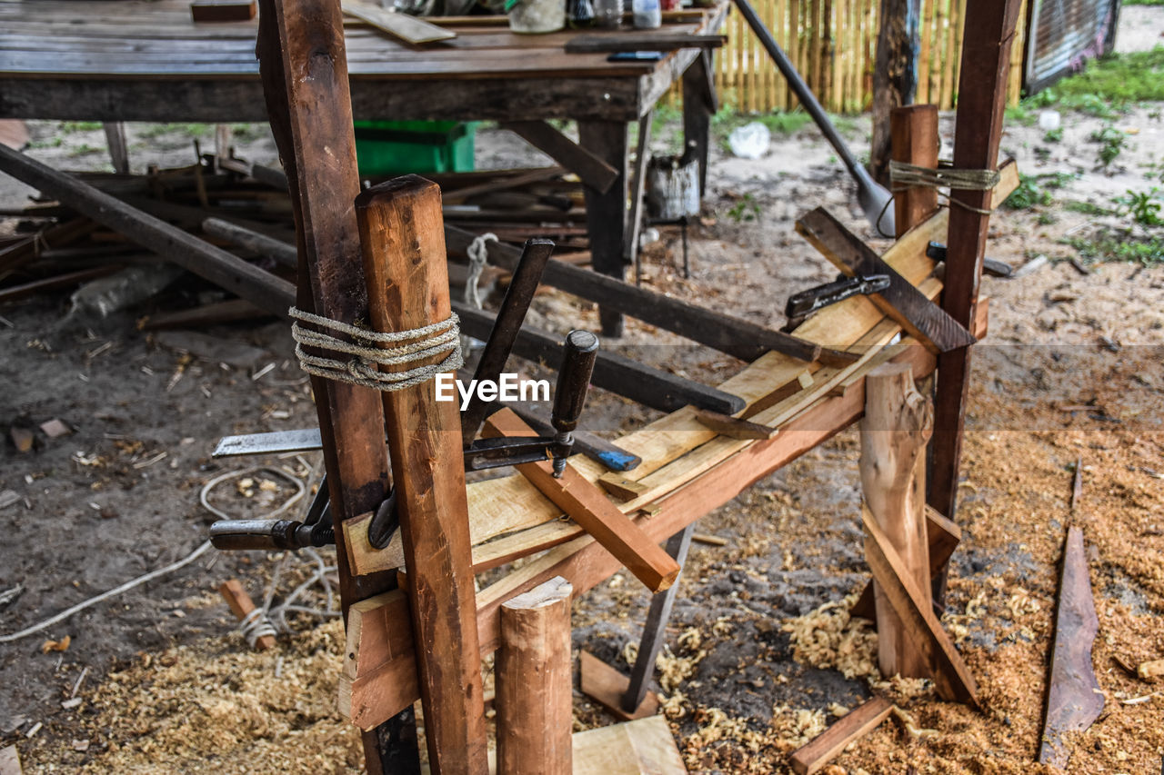 HIGH ANGLE VIEW OF OLD RUSTY MACHINE PART