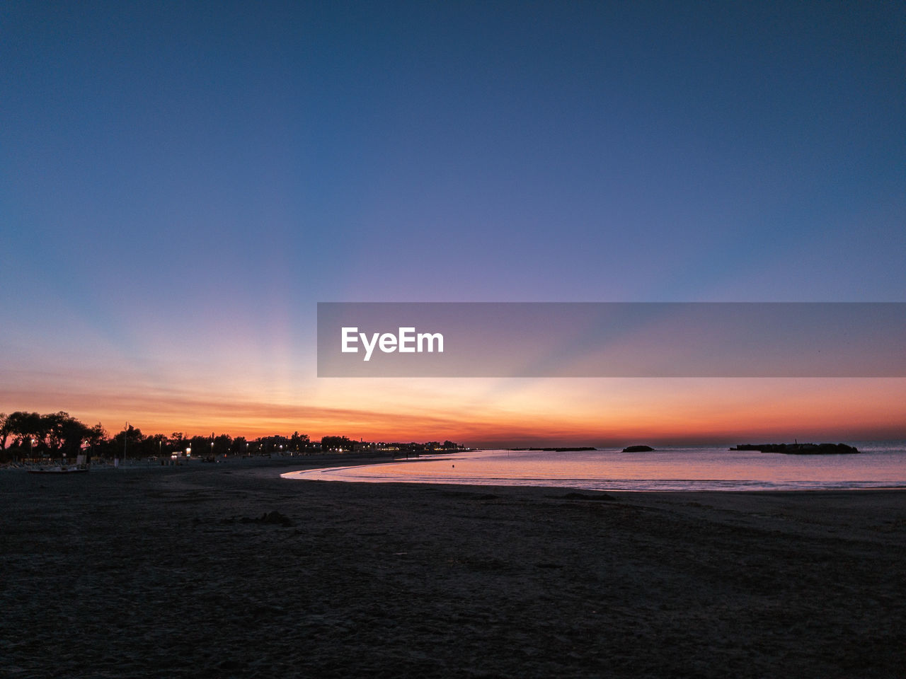 Scenic view of sea against clear sky during sunset in rimini