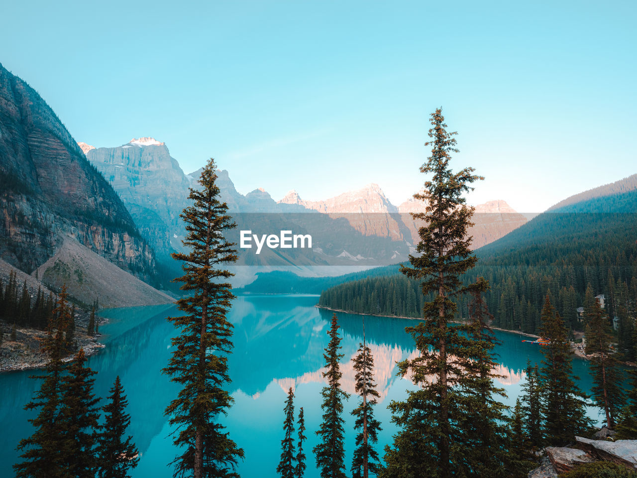 Scenic view of snowcapped mountains and lake against sky