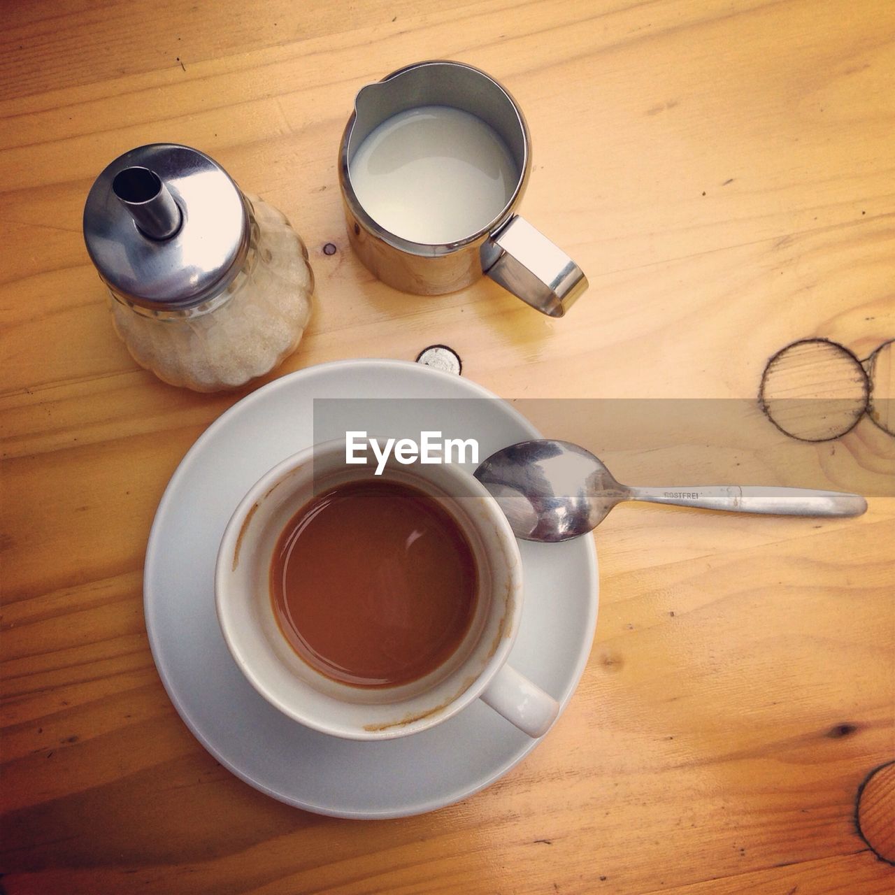 Overhead view of tea cup on table