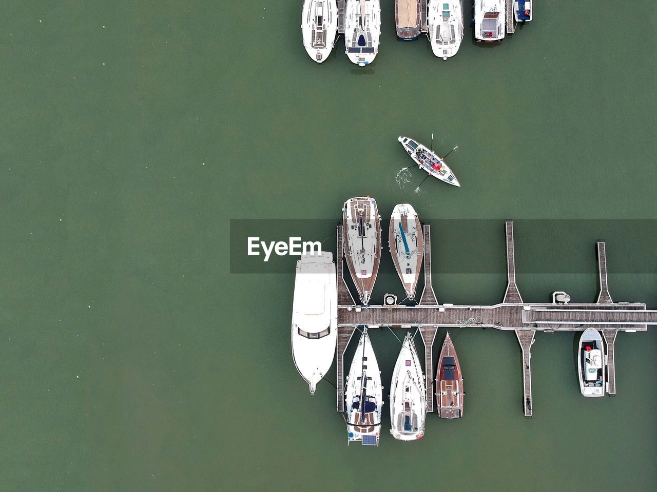 HIGH ANGLE VIEW OF SHIP MOORED IN RIVER