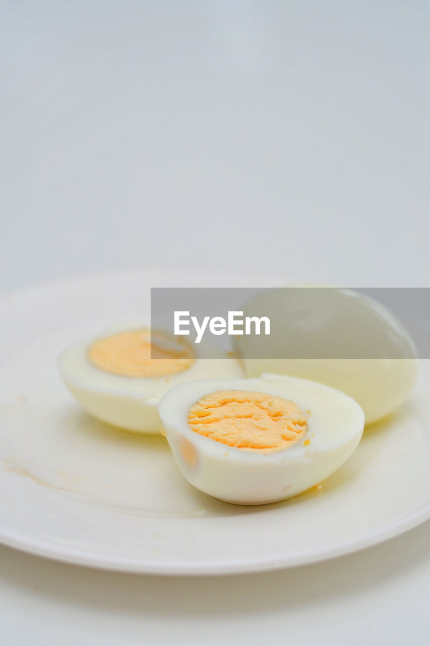 food and drink, food, egg, plate, healthy eating, studio shot, breakfast, indoors, wellbeing, freshness, no people, produce, dish, close-up, white, egg yolk, simplicity, meal, white background, copy space