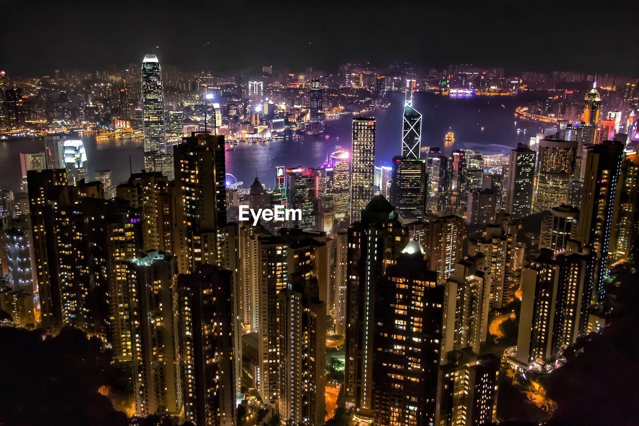 Aerial view of city lit up at night