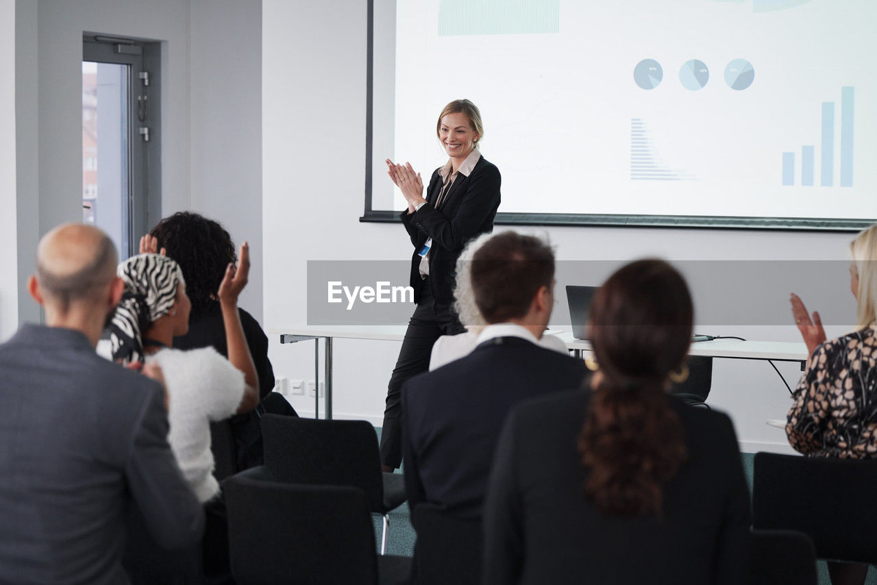 Woman having presentation during business meeting