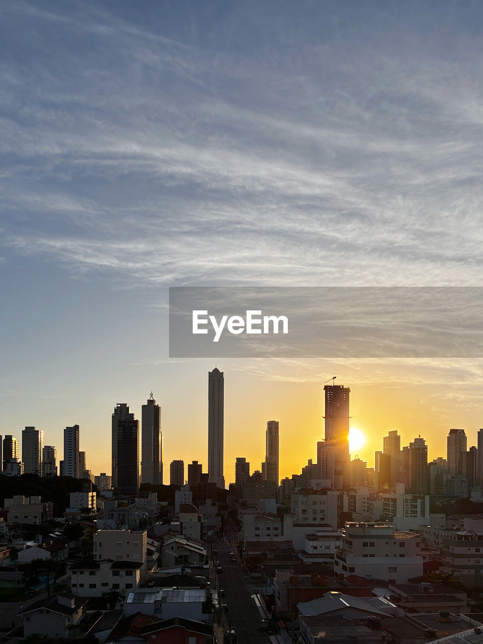 city, architecture, building exterior, built structure, building, sky, cityscape, horizon, landscape, skyscraper, urban skyline, office building exterior, skyline, sunset, residential district, nature, urban area, city life, travel destinations, metropolitan area, metropolis, downtown district, cloud, no people, dusk, high angle view, sunlight, downtown, outdoors, development, daytime, evening, travel, office, business, tower, business finance and industry, dramatic sky, illuminated, tower block