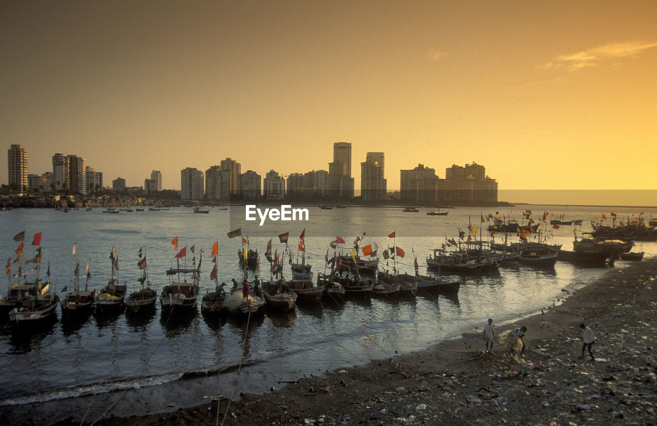 view of buildings in city at sunset