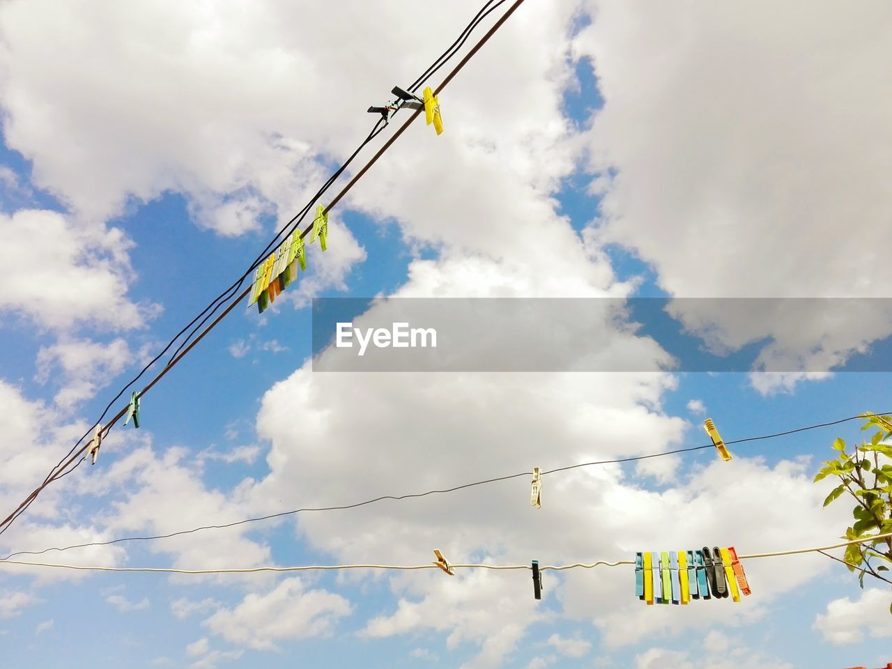 Low angle view of cables against sky