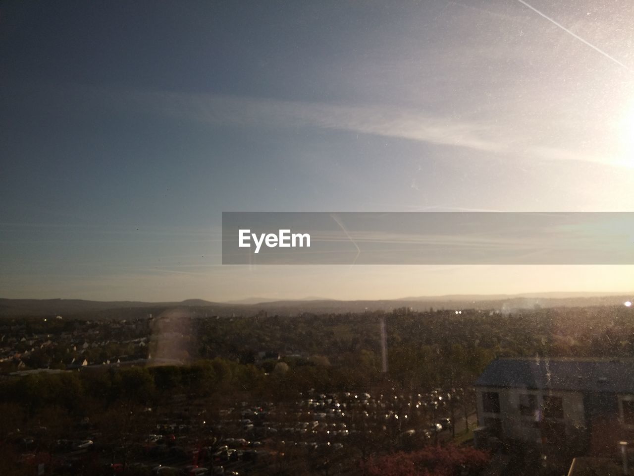 VIEW OF CITYSCAPE AT SUNSET