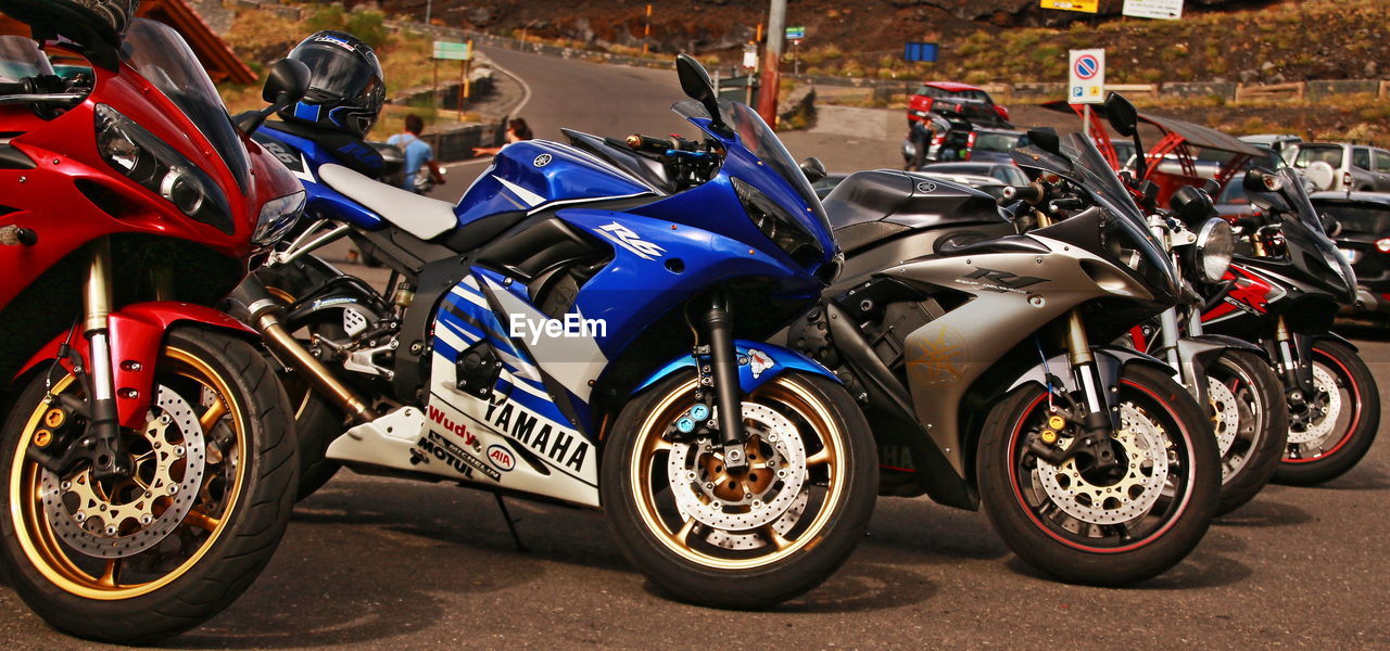 Motorcycles parked on road