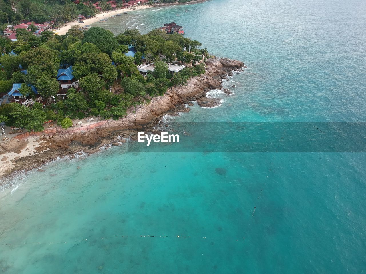 HIGH ANGLE VIEW OF SEA AND SHORE