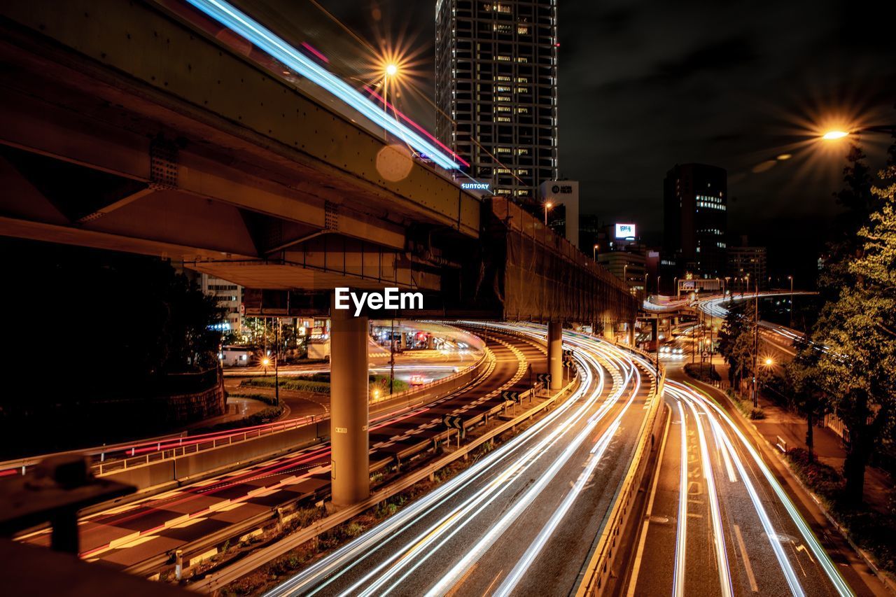 Light trails on city street at night